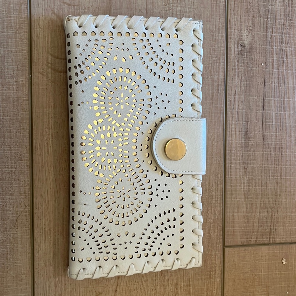 Never used white leather clutch/wallet with cutout leather detail